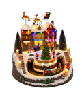 saint joy villaggio natalizio luminoso xmas town a batteria con luci led musica albero rotante trenino in movimento e slitta di babbo natale 27x25x34 cm ean 8050043127693
