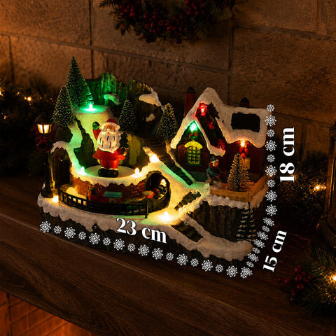 saint joy litville villaggio di natale illuminato led con trenino in movimento e babbo natale rotante 8 melodie natalizie 23x15x18 cm a batteria ean 8050043127709